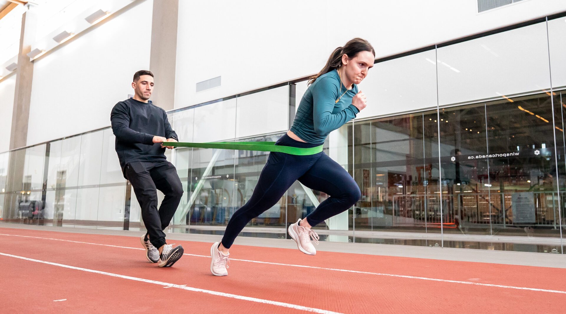 National team speed skater Heather McLean works with strength coach Nate Morris in the Canadian Sport Institute Calgary high performance training facilities in Calgary, AB on March 27, 2023. (Photo: Dave Holland/CSI Calgary).